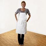 woman wearing white apron